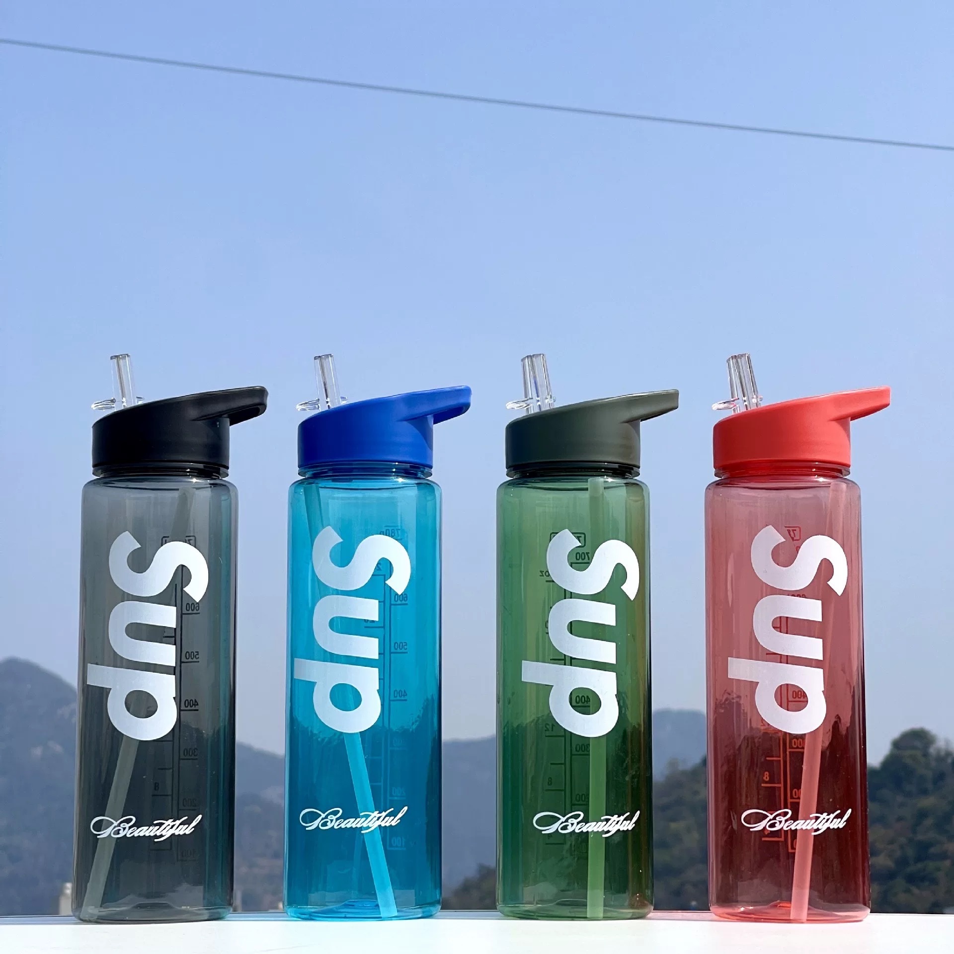 Outdoor fitness sports plastic cup, large-capacity, graduated, portable and simple space cup, LOGO printable, water bottle customization full figure