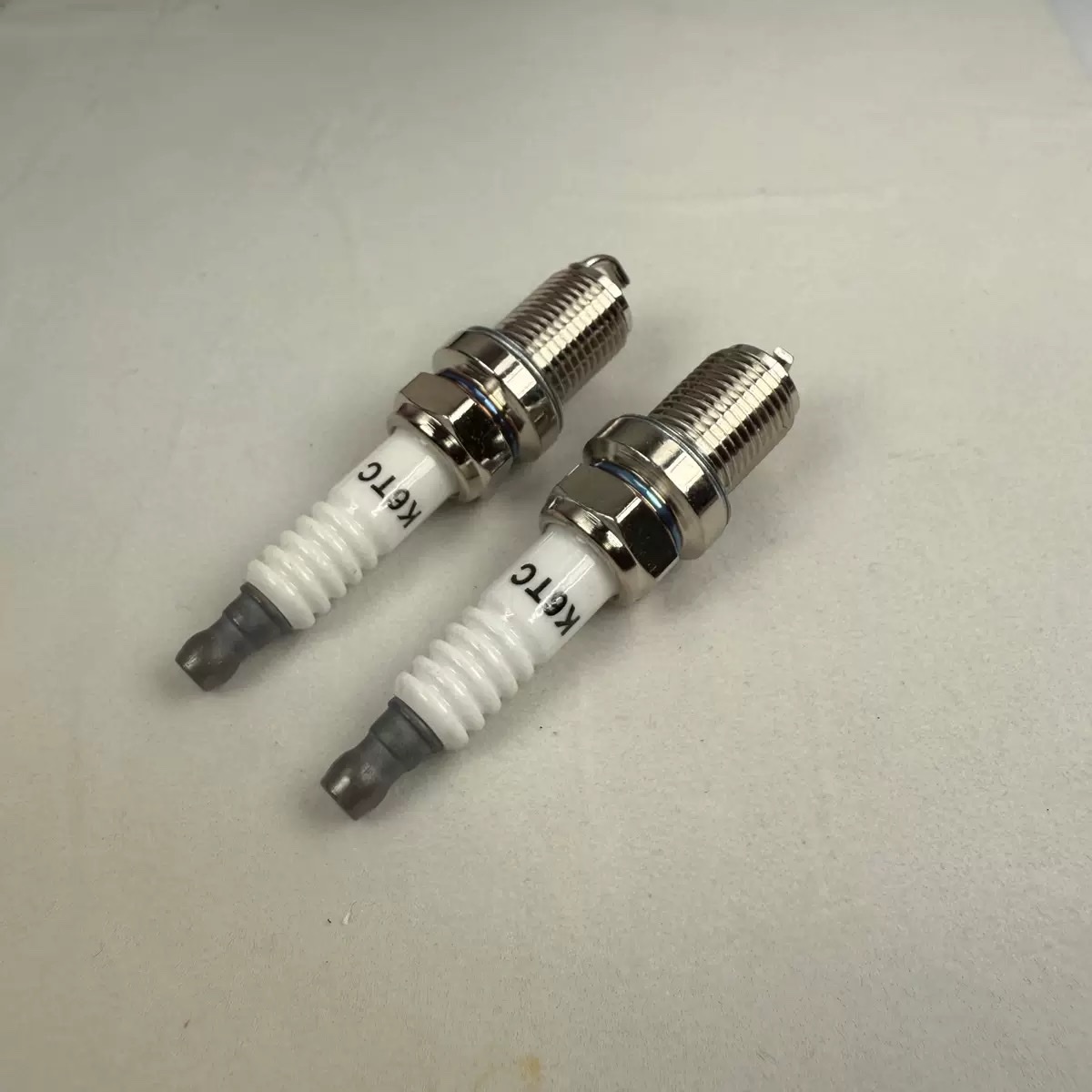 High-performance spark plugs for automotive spark races, compatible with multiple vehicle models, durable and reliable. 1