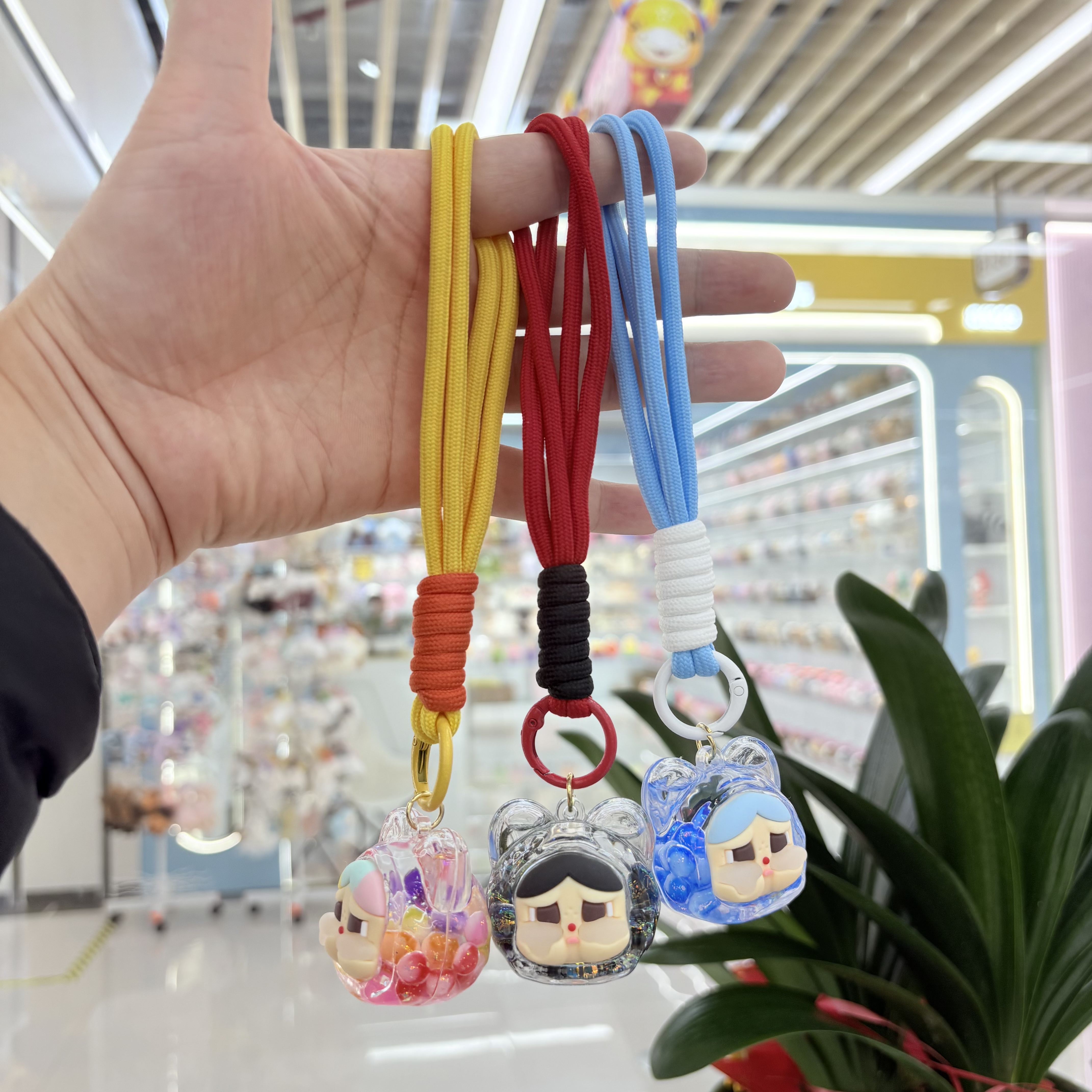 跨境爆款哭娃钥匙扣挂件亚克力入油卡通可爱包包挂件学生书包挂件车载挂件批发详情图6
