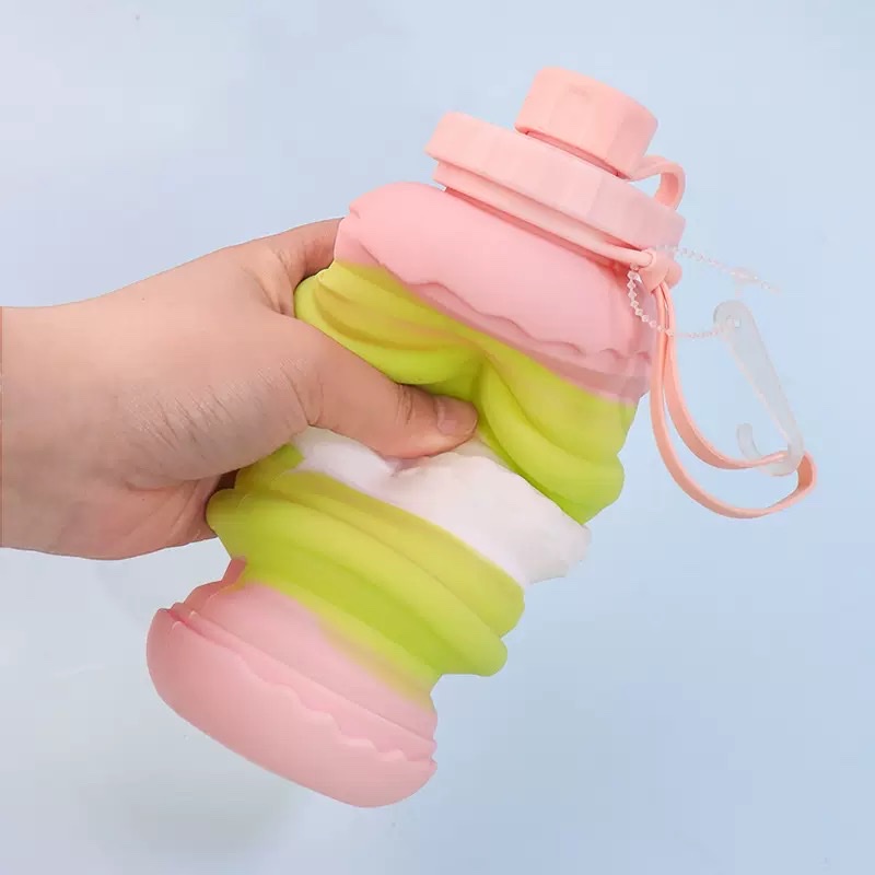 Cross-border best-selling folding water cup, portable shockproof and leak-proof cake telescopic water cup, creative outdoor silicone folding water bottle, novel and original design Application Scenario