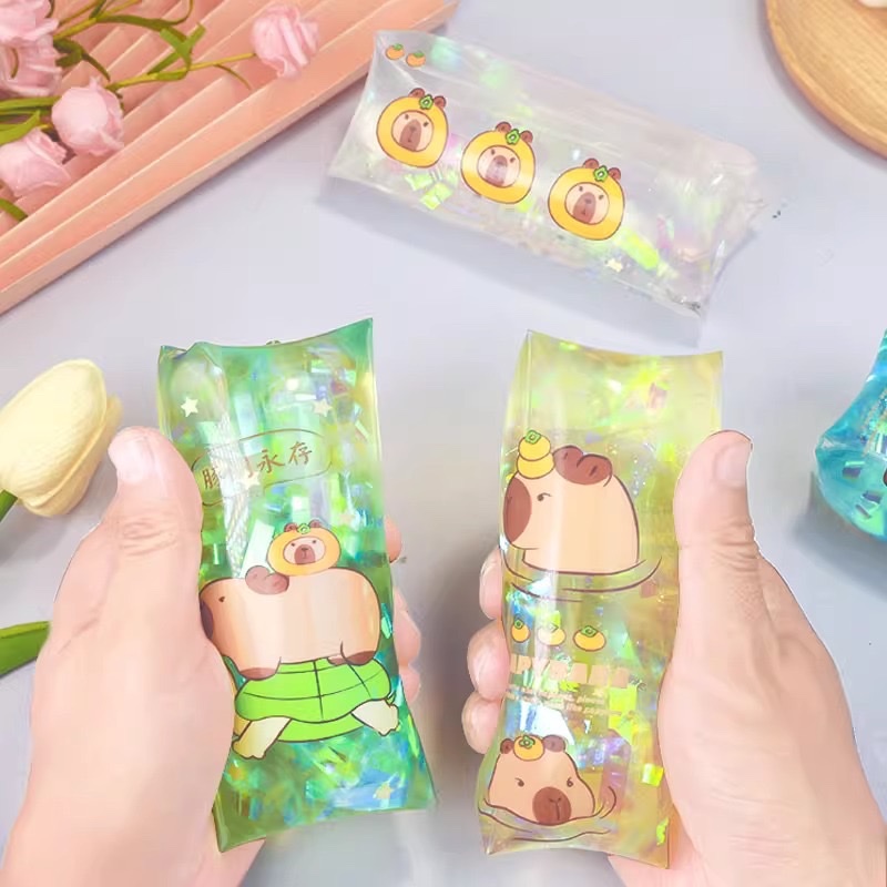Factory direct sales of stress-relieving toys. Water snake that can't be caught by the Internet celebrity Kapiba. Water snake stress-relieving toys that can't be caught. Cute children's release and stress relief. Big slippery water bag details Picture