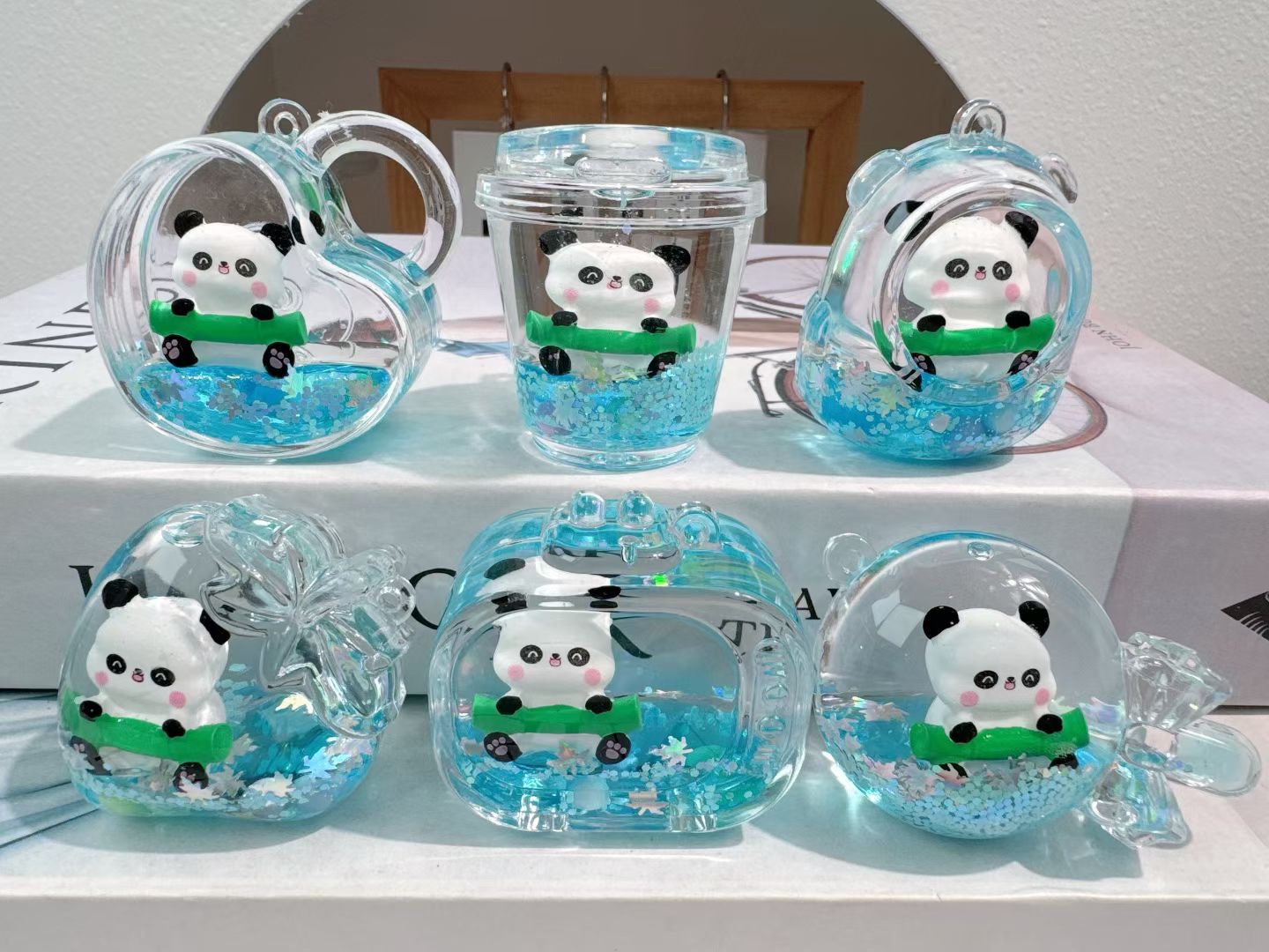 跨境爆款迪士尼流沙瓶钥匙扣挂件可爱卡通入油爆闪书包挂饰米奇米妮唐老鸭维尼熊挂件批发详情图15