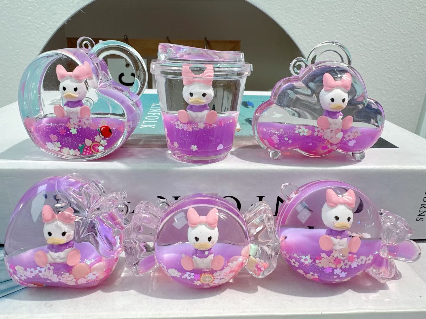 跨境爆款迪士尼流沙瓶钥匙扣挂件可爱卡通入油爆闪书包挂饰米奇米妮唐老鸭维尼熊挂件批发详情图6