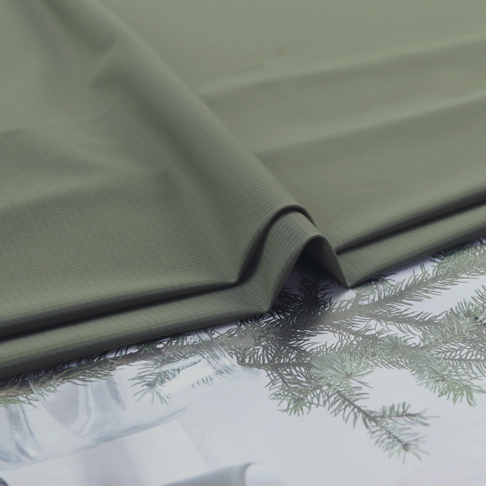 锦纶高弹凉感速干运动服面料春夏精致格面料排汗透气舒适布料细节图