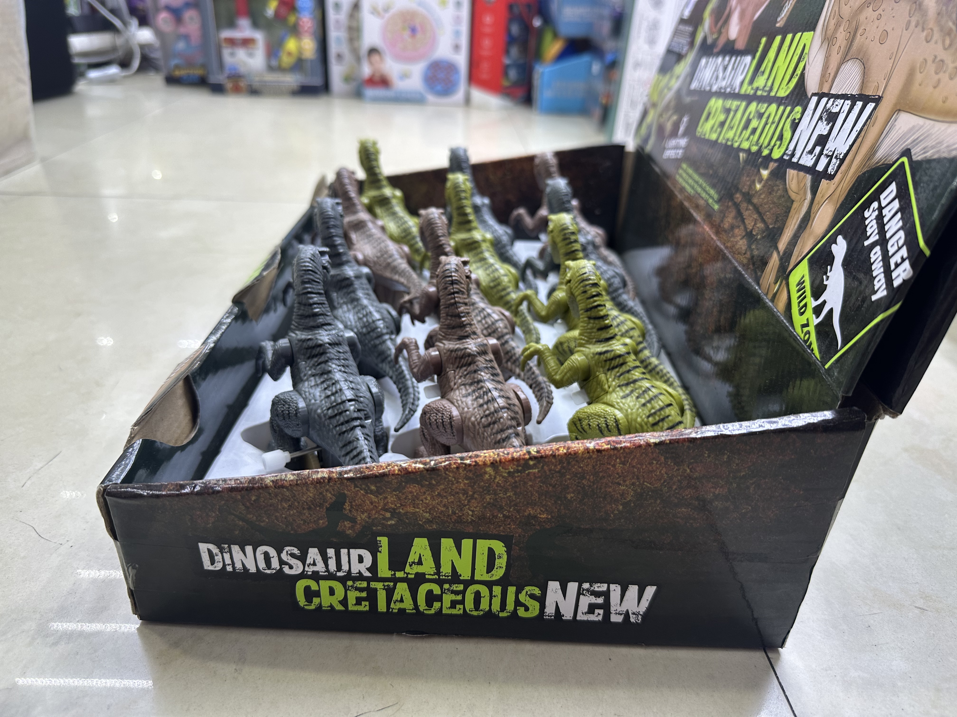 电动万向恐龙软硅胶贴片儿童圣诞节装扮扭蛋机按压恐龙白底实物图