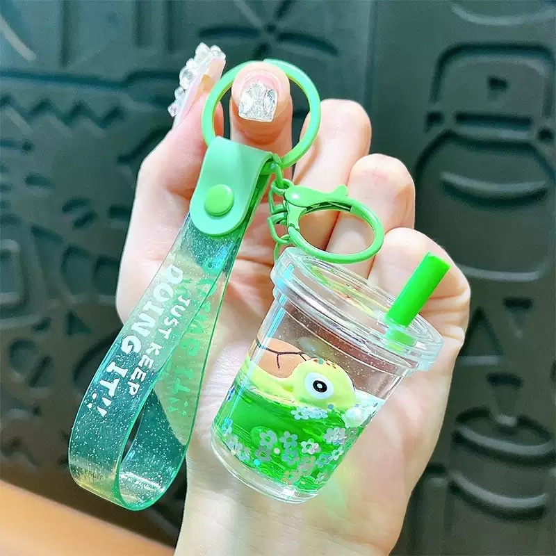Cartoon oil-filled sand bottles, acrylic Ocean Story car keychains, pendants, chain decorations, wholesale small gifts, blind boxes detail image 4