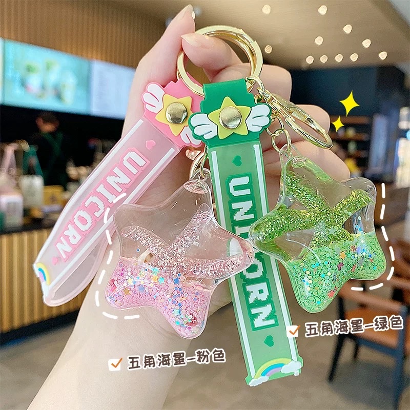 Starfish oil flowing sand bottle keychain, exquisite pendant for women, children and students, schoolbag hanging decoration, cute floating key chain, star blind box