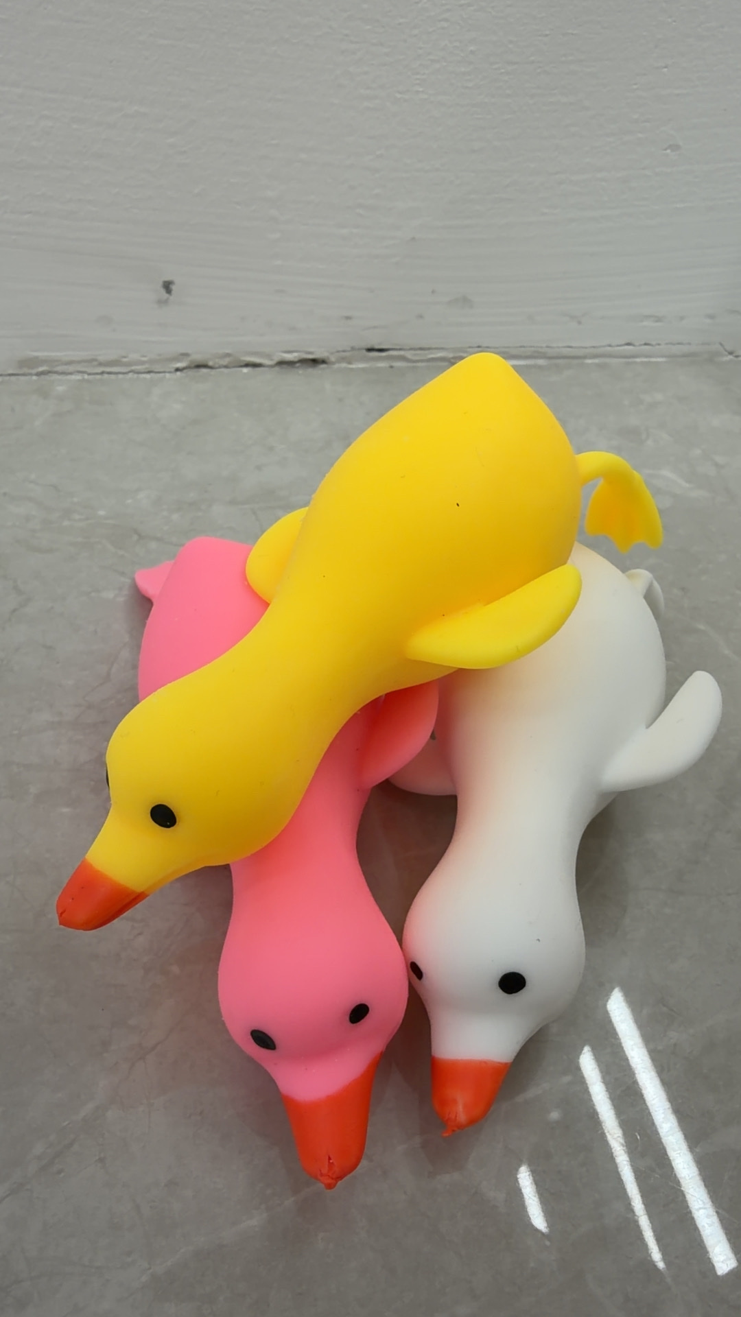 Little duckling pinches toys