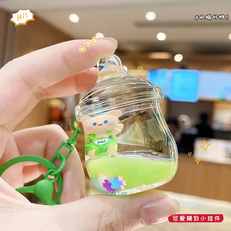 新款创意流沙挂件背带坐姿熊入油漂浮钥匙扣可爱漂流瓶女生小吊坠盲盒详情图4