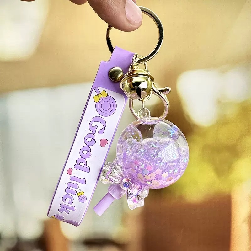 Flowing sand in oil, floating lollipop keychain, exquisite girls' small pendant, children's schoolbag, cute key chain hanging decoration, blind box detail image 5