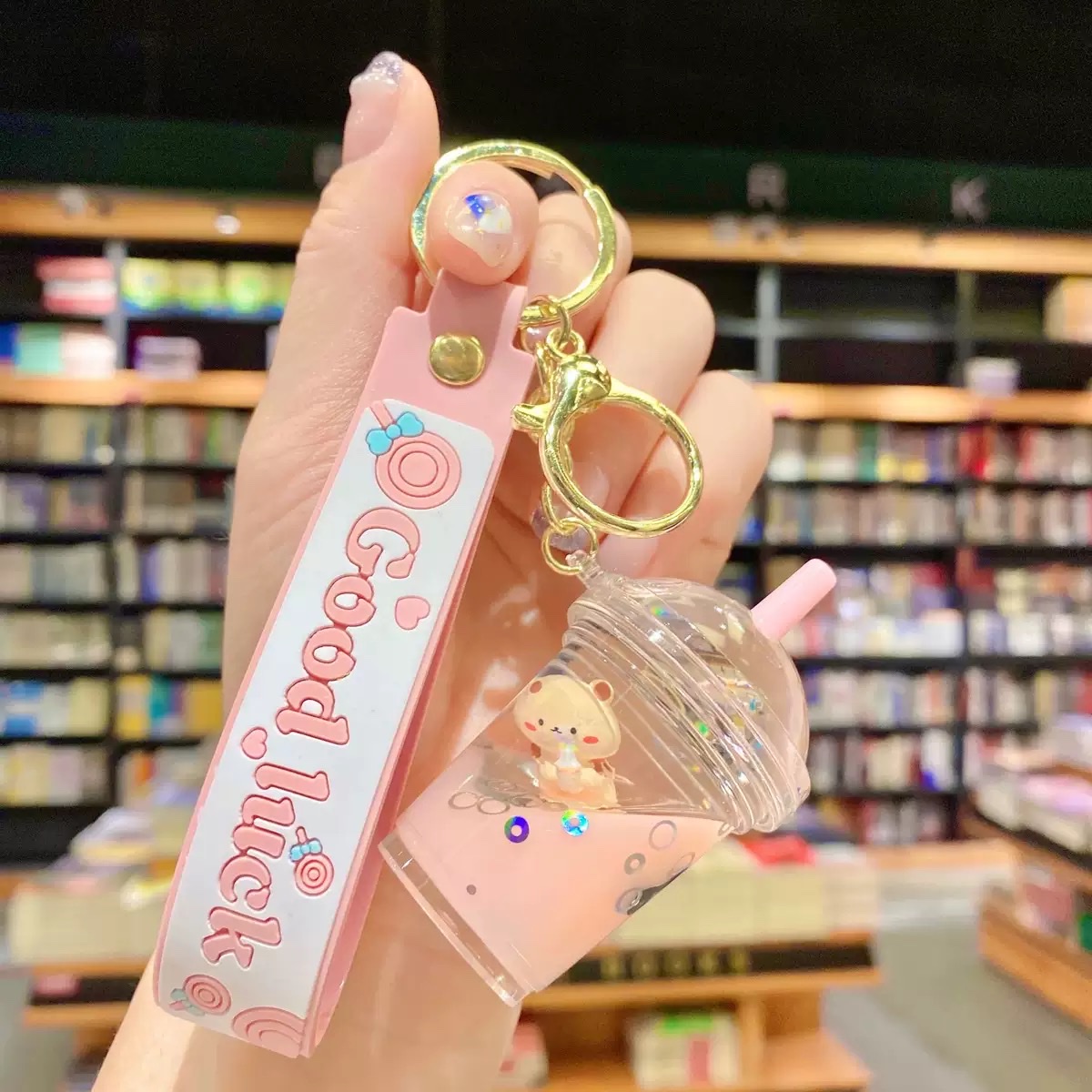 Internet-famous cartoon oil floating bubble milk tea bear keychain, cute and trendy car key chain, schoolbag pendant, blind box detail image 5