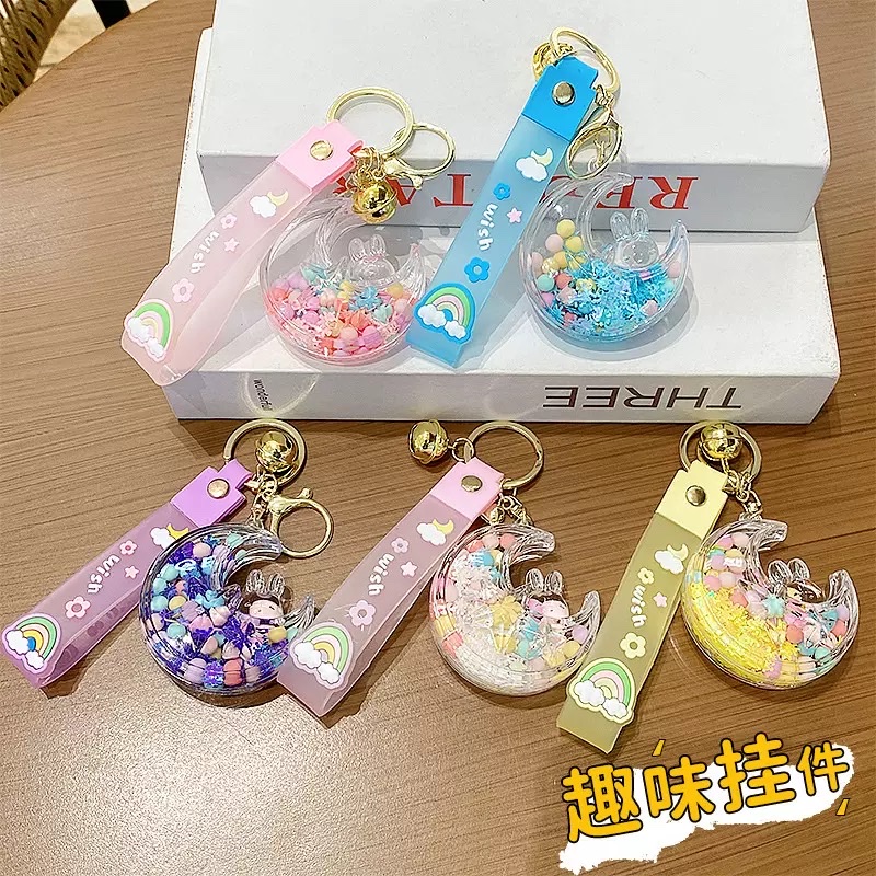 Internet-famous oil-filled colorful bubble beads, star and moon rabbit keychains, girlish heart, flowing sand bottle pendants, couple backpacks, hanging decorations, men's blind boxes
