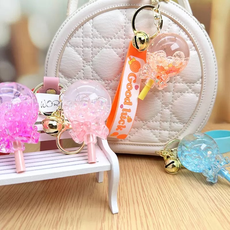 Flowing sand in oil, floating lollipop keychain, exquisite girls' small pendant, children's schoolbag, cute key chain hanging decoration, blind box detail image 3