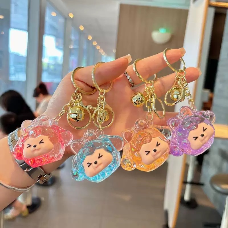 The popular acrylic little sheep sand bottle keychain, cute kiki figurine, bag pendant, gift key chain, blind box detail image 2