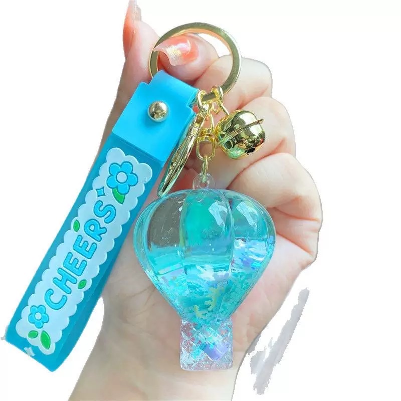 Creative oil, girlish heart, snowflake candy beans, flowing sand bottle, keychain, liquid drift, hot air balloon, key chain, small pendant, blind box Item Picture