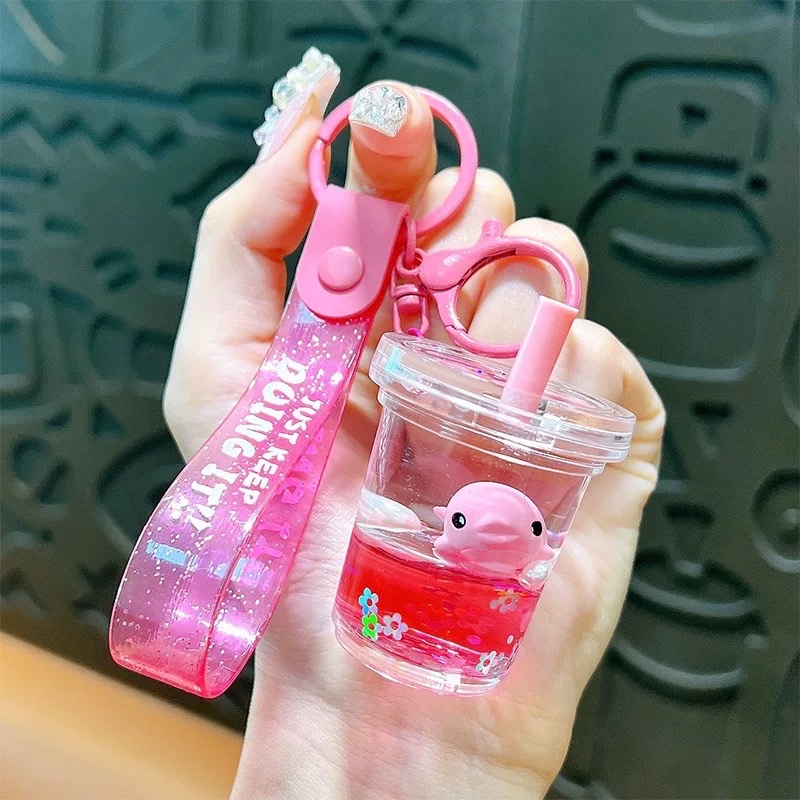 Cartoon oil-filled sand bottles, acrylic Ocean Story car keychains, pendants, chain decorations, wholesale small gifts, blind boxes detail image 2