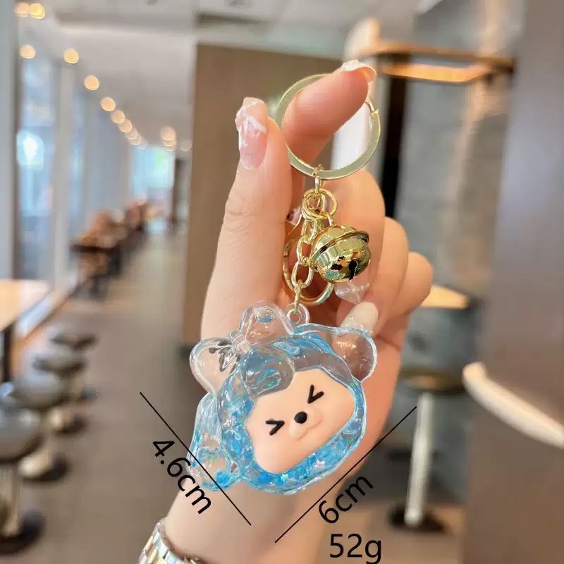 The popular acrylic little sheep sand bottle keychain, cute kiki figurine, bag pendant, gift key chain, blind box detail image 4