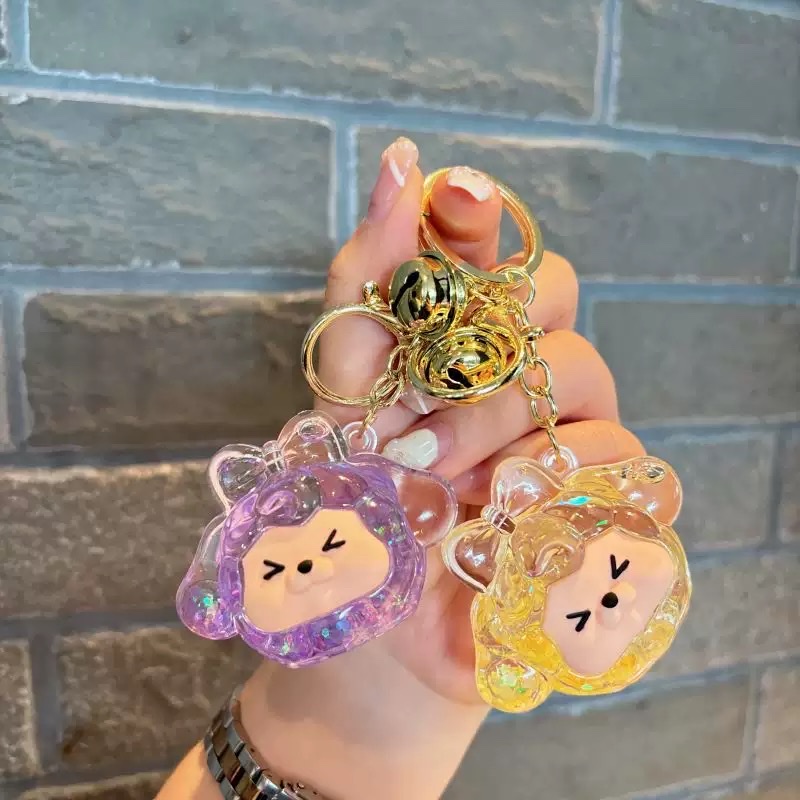 The popular acrylic little sheep sand bottle keychain, cute kiki figurine, bag pendant, gift key chain, blind box