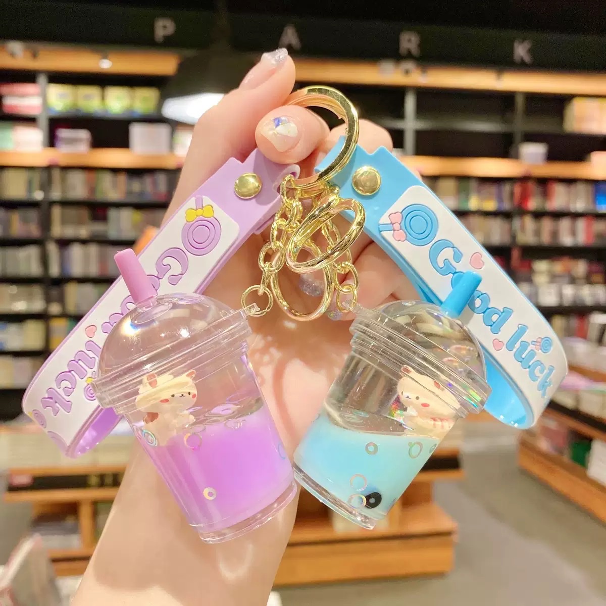 Internet-famous cartoon oil floating bubble milk tea bear keychain, cute and trendy car key chain, schoolbag pendant, blind box detail image 2