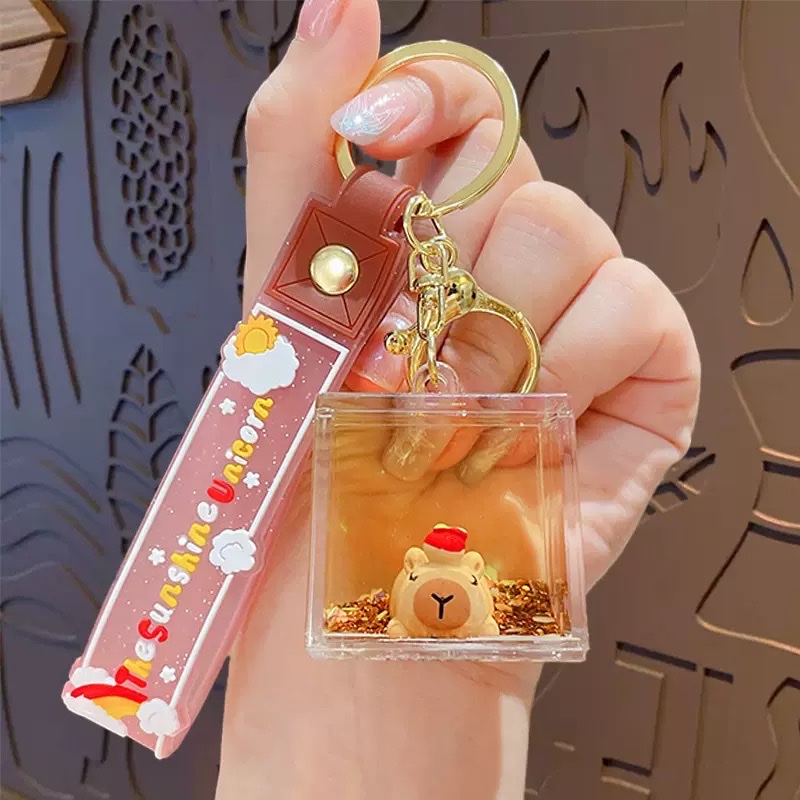 亚克力入油流沙瓶可爱卡皮巴拉钥匙扣包包挂件液体流沙玩具钥匙链盲盒白底实物图