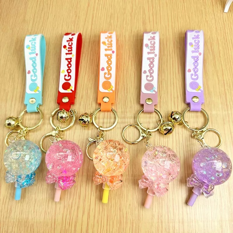 Flowing sand in oil, floating lollipop keychain, exquisite girls' small pendant, children's schoolbag, cute key chain hanging decoration, blind box details Picture