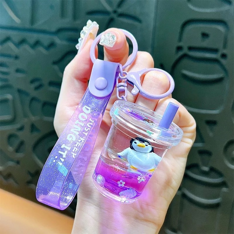 Cartoon oil-filled sand bottles, acrylic Ocean Story car keychains, pendants, chain decorations, wholesale small gifts, blind boxes Specification image