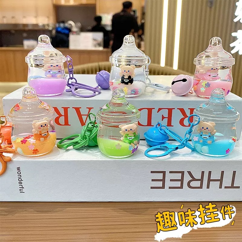 新款创意流沙挂件背带坐姿熊入油漂浮钥匙扣可爱漂流瓶女生小吊坠盲盒