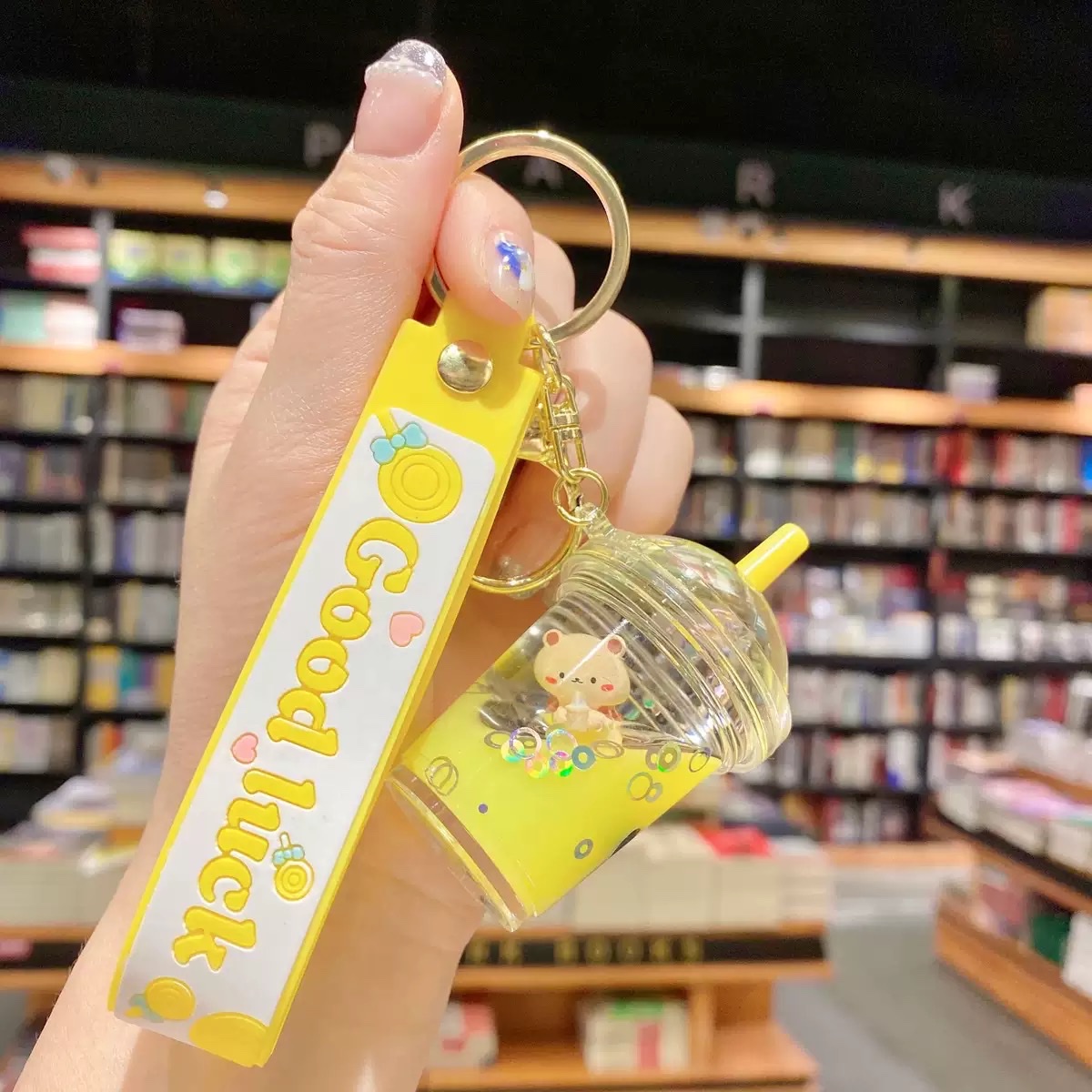 Internet-famous cartoon oil floating bubble milk tea bear keychain, cute and trendy car key chain, schoolbag pendant, blind box detail image 4