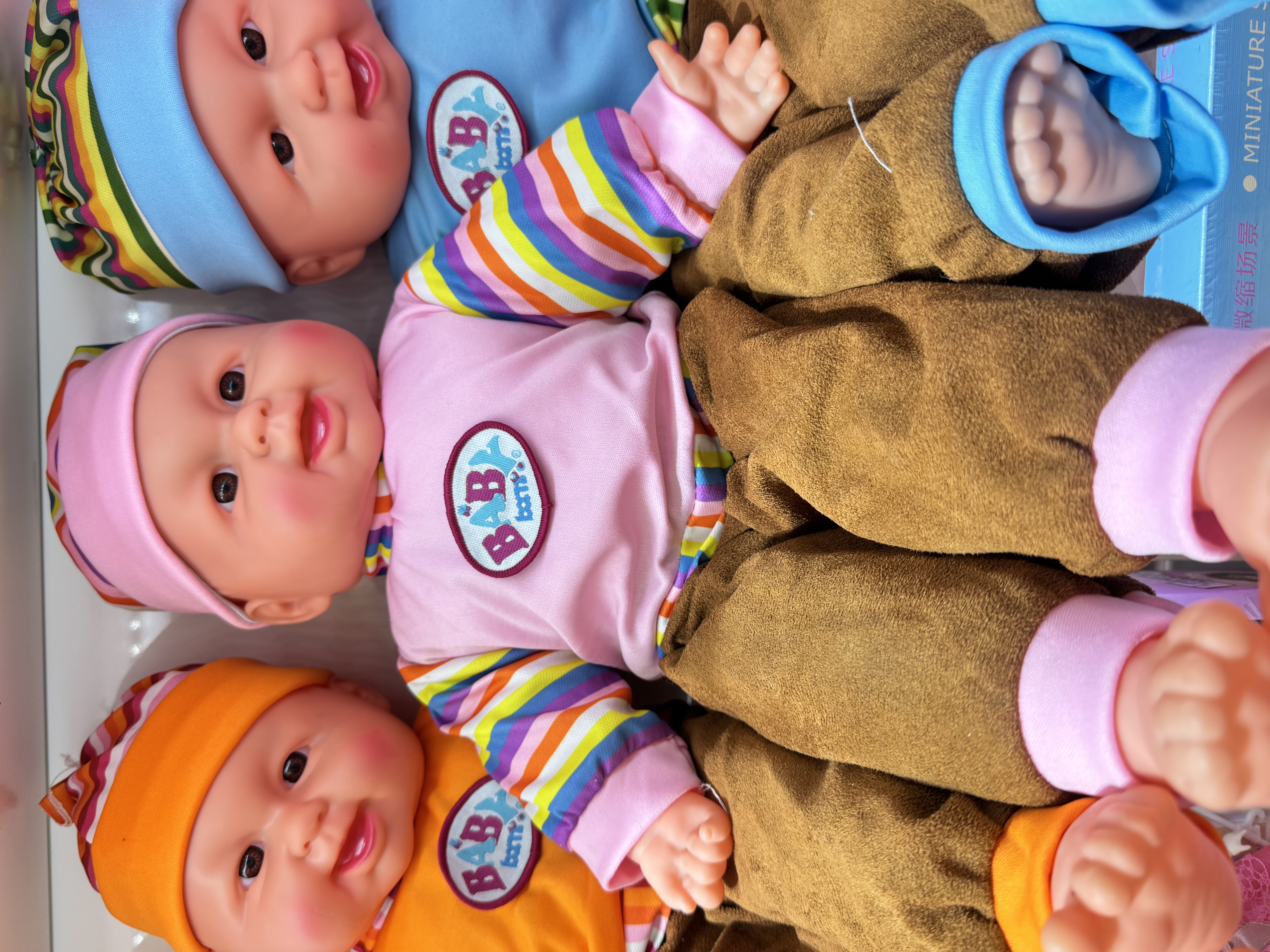 Simulated baby doll, doll, baby sleeping companion, soothing doll, playhouse prop for kindergarten class, doll, vinyl doll, doll with laughter, striped element, doll with cotton details Picture