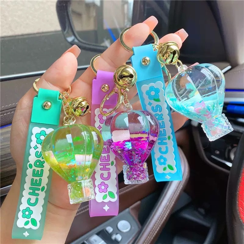 Creative oil, girlish heart, snowflake candy beans, flowing sand bottle, keychain, liquid drift, hot air balloon, key chain, small pendant, blind box details Picture