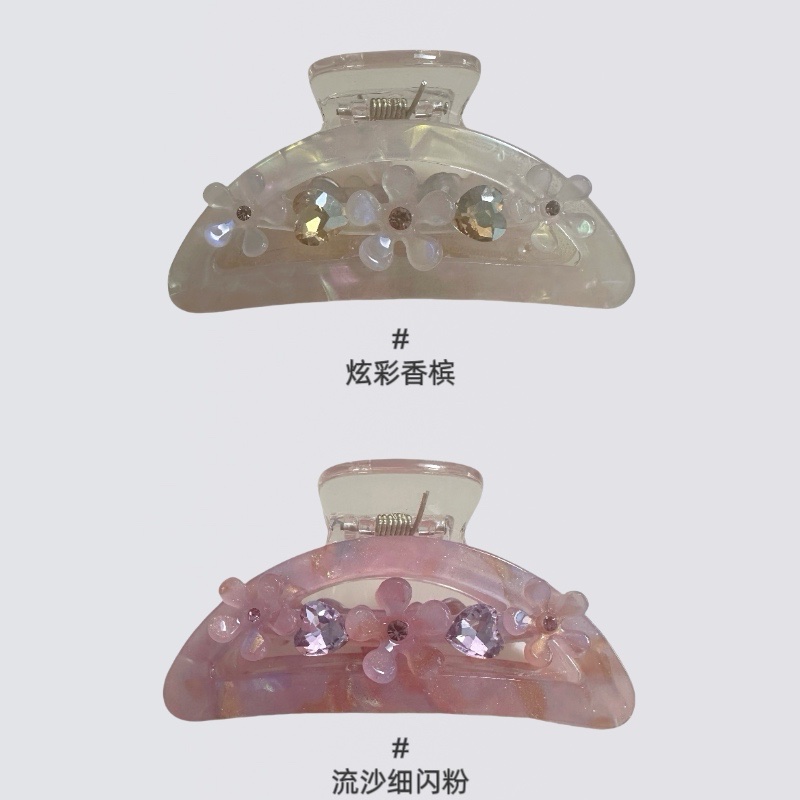 A sweet and delicate girl with a flower-shaped updo, a shark clip, and a light luxury color diamond grab clip hair accessory detail image 4