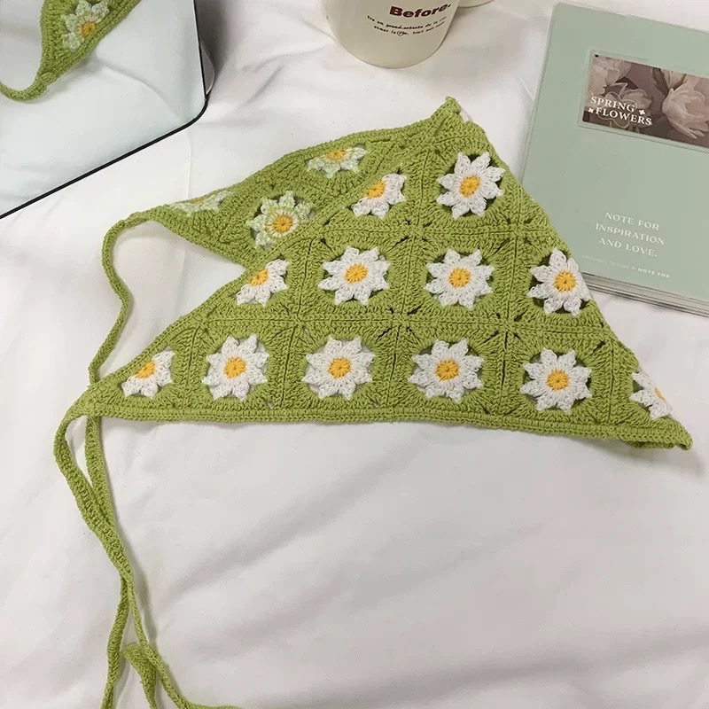 A sweet and cute hand-knitted hairband for a girl with a girlish style and a unique crocheted artistic style, a triangular headscarf