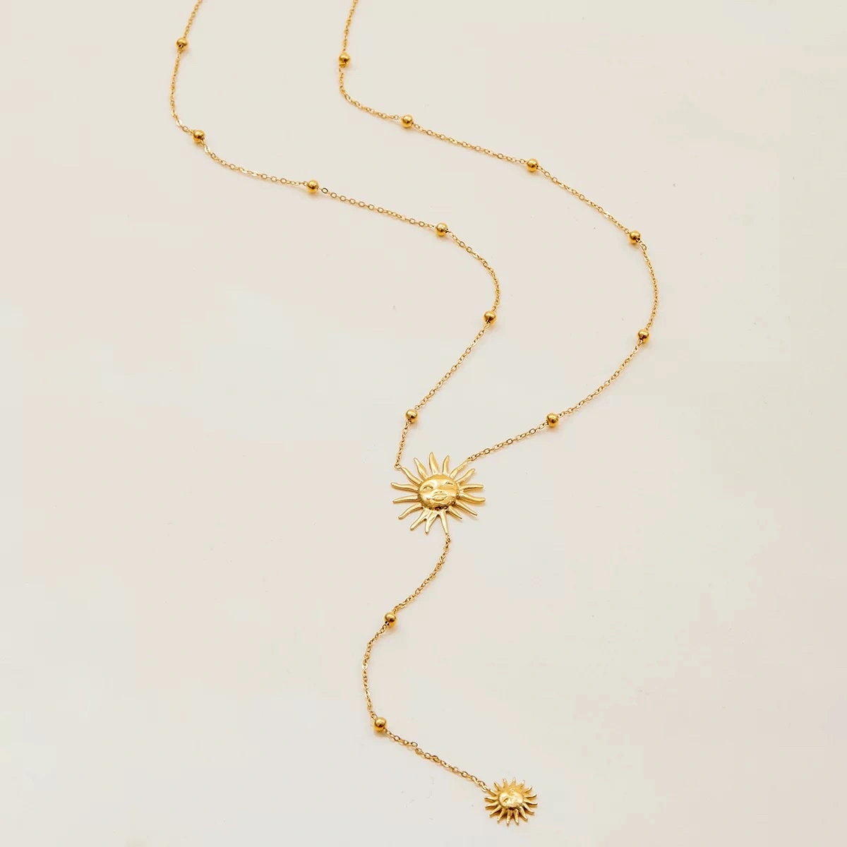 European and American titanium steel sun Y-shaped chain long necklace with a light luxury feel, stainless steel collarbone chain jewelry that does not fade detail image 5