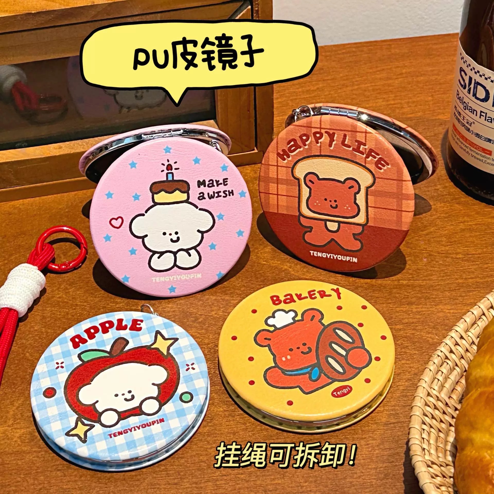 Cute cartoon illustration folding mirror, portable and small makeup mirror for girls, portable high-definition touch-up mirror, hanging rope small mirror, portable folding portable makeup mirror, desktop can stand, student dormitory girls, office good items, dressing mirror Application Scenario