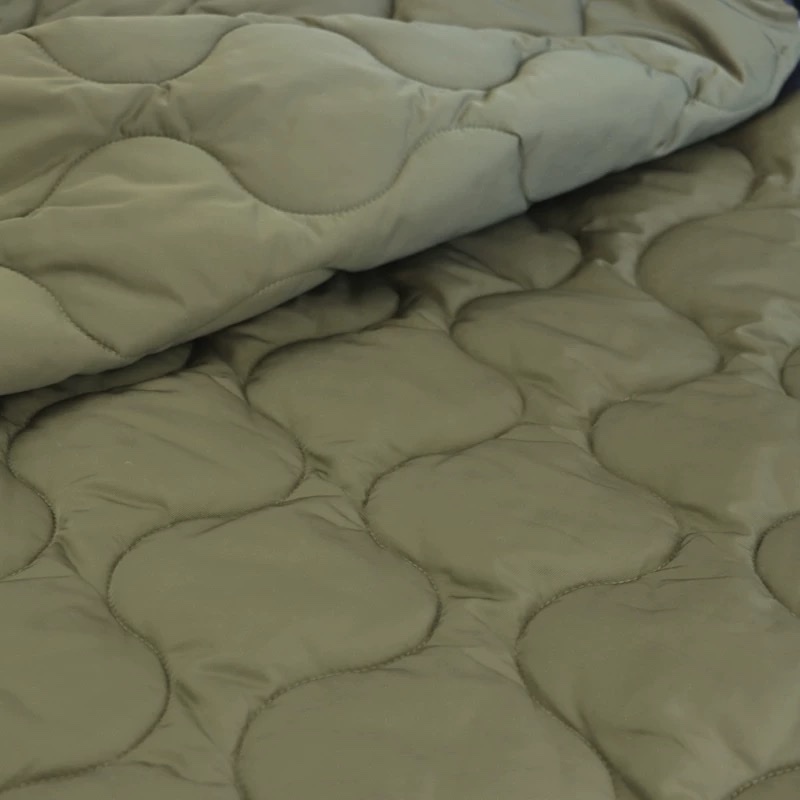 军绿色双面厚实保暖绗棉葫芦型新雪丽夹棉弧形绗缝面料冬棉衣布料