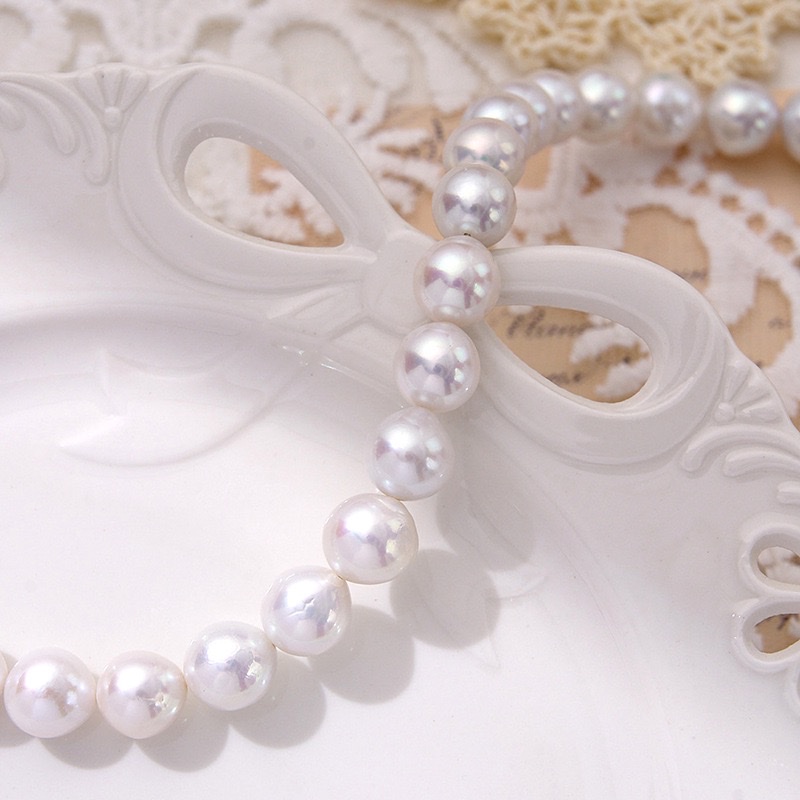 精品短水滴近圆爱迪生天然淡水珍珠高品质光滑圆珠白底实物图