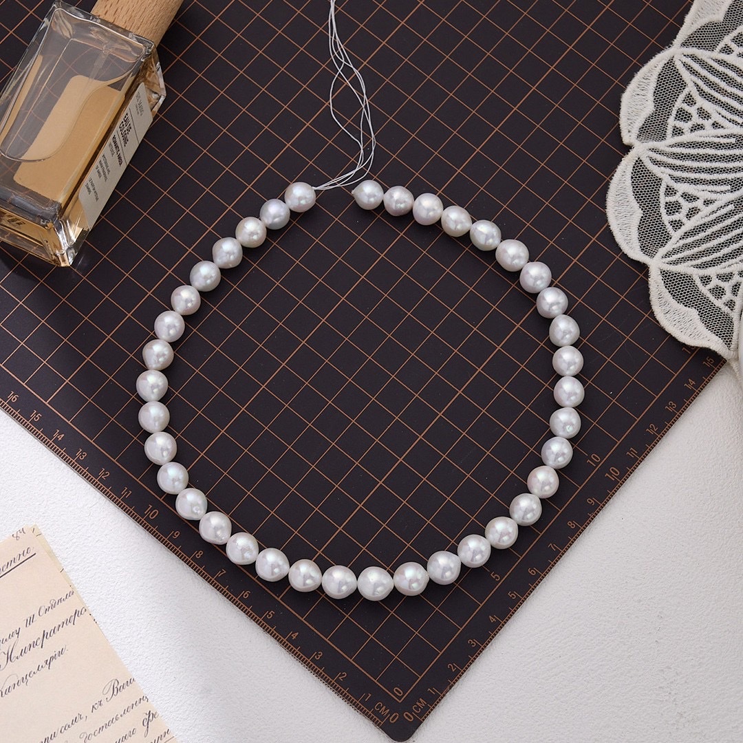 精品短水滴近圆爱迪生天然淡水珍珠高品质光滑圆珠产品图