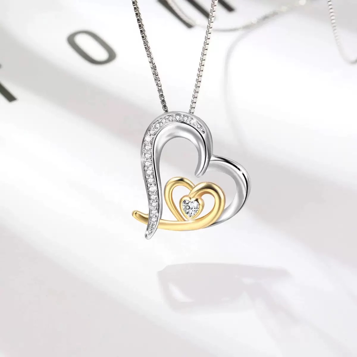 The New S925 Silver Necklace With A Unique Double Heart Color Separation Pendant Is A Cross-Border Women's Jewelry From Europe And America