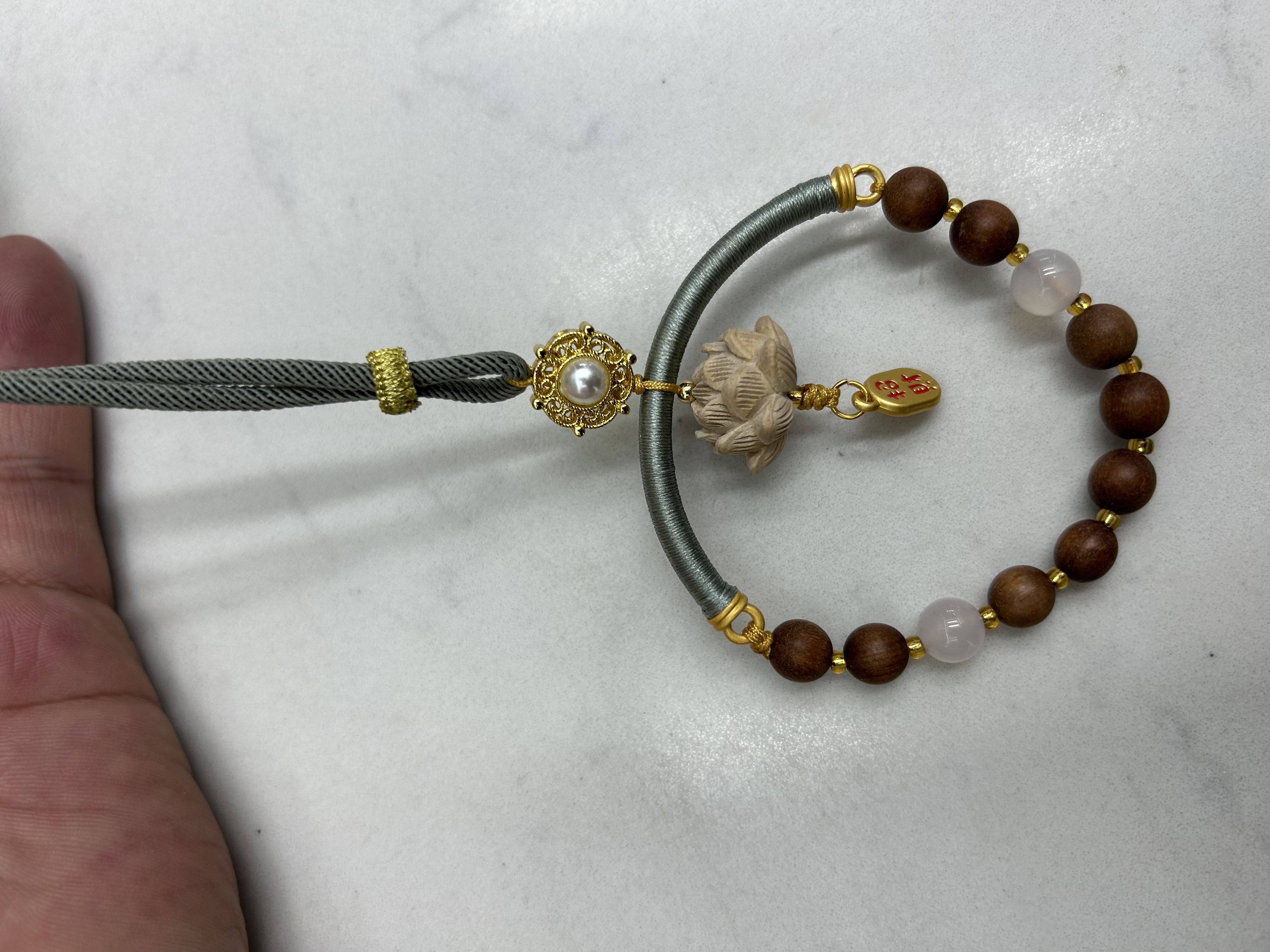 Boxwood lotus pendants can be hung on bags, on carts or at home Application Scenario