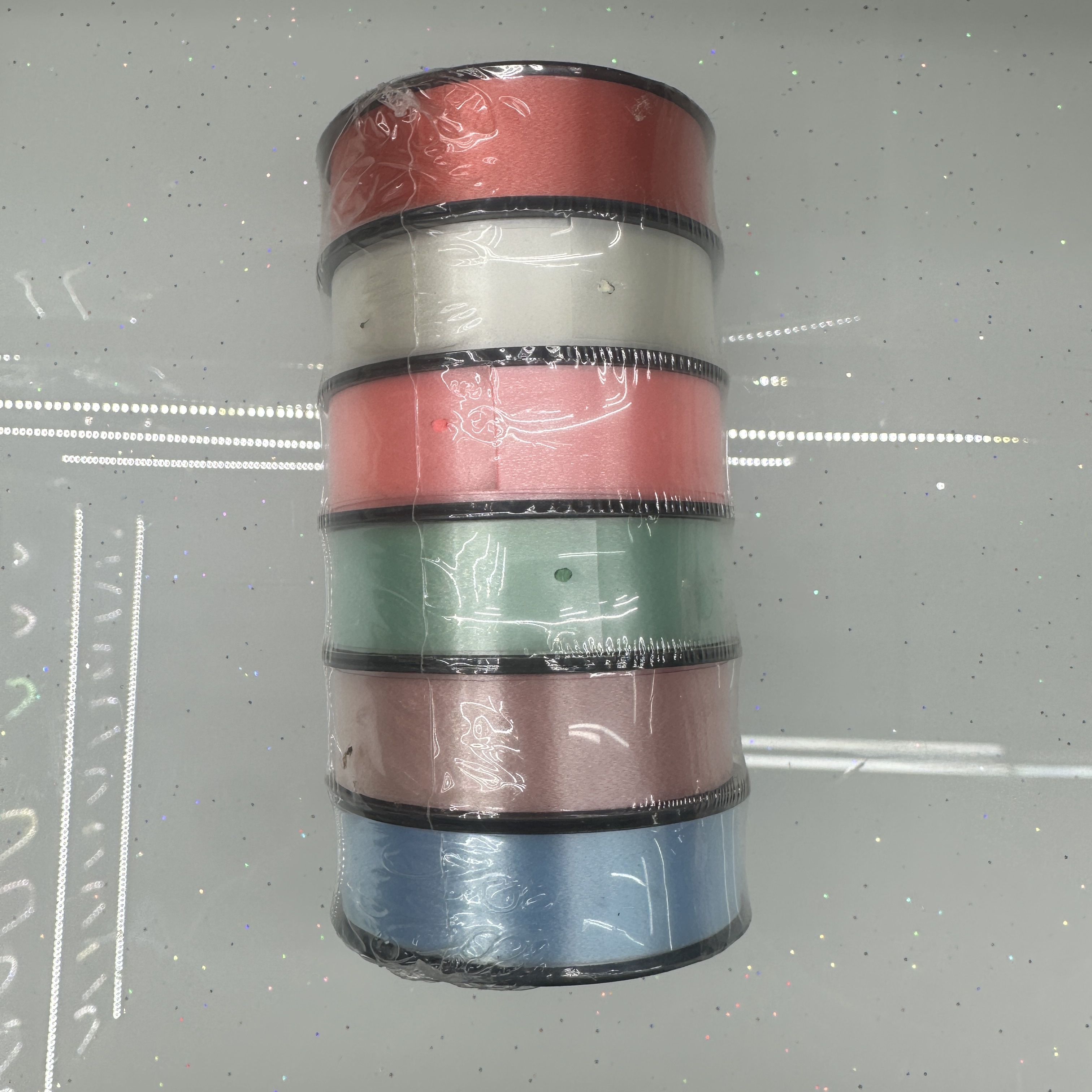 Each tube is decorated with 6 pieces of 1.8CM plain color festival gift packaging ribbons full figure