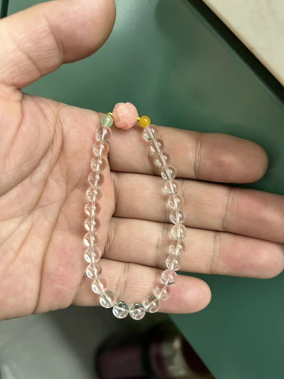 White crystal single-ring bracelet, pink Bodhi lotus accessories, and yellow and green agate embellishments detail image 2
