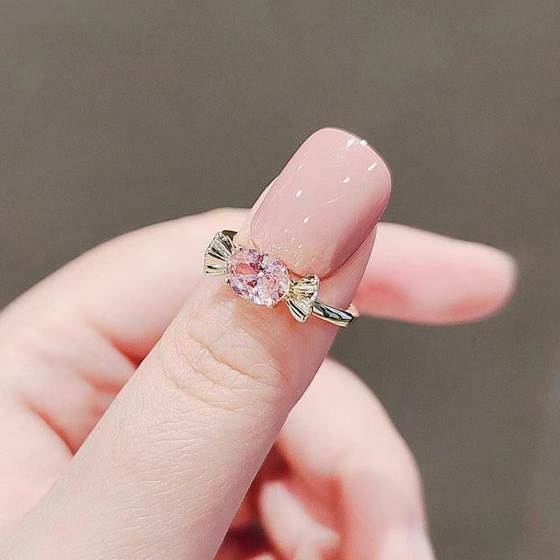 Japanese-style cute pink candy bow ring, a light luxury and niche girl's finger ring with adjustable opening, a best friend ring, a silver ring, a unique children's ring for women, a vintage brushed ring accessory Item Picture