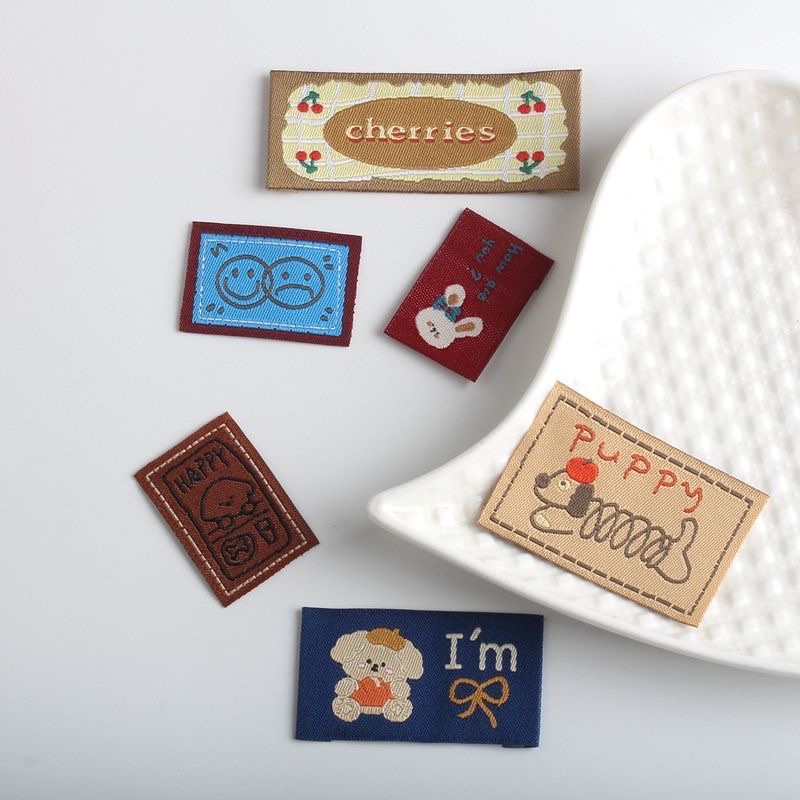 Collar label, fabric label, Korean-style rabbit and cat wash label, bag and hat trademark, high-end decorative woven label, sewing accessories details Picture