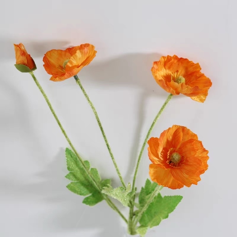 Four artificial flowers, a plush decorative flower by Yu Meiren, are placed on the living room table as wedding photography props Item Picture