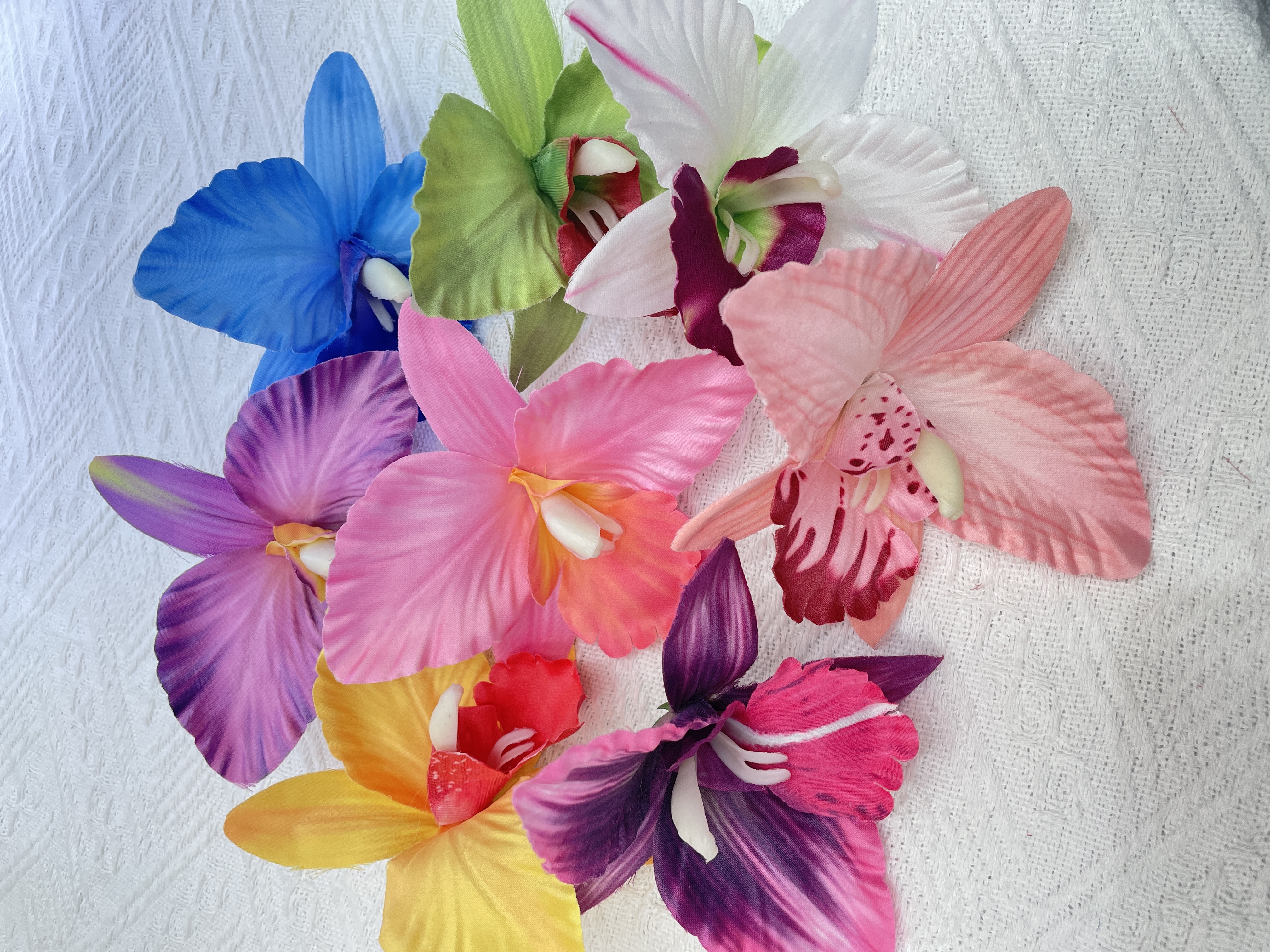 Wholesale of popular artificial flowers, fake flowers, cattelan hair flowers, hat flowers, shoe flowers and artificial flowers