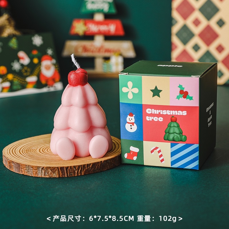 Apple Christmas Tree scented candles create an atmosphere as a souvenir gift. Handcrafted scented candles simulate Christmas shapes, wax candles, and scented candles for Christmas Specification image