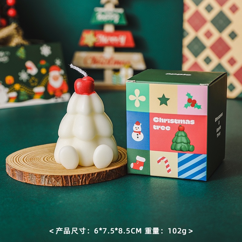 Apple Christmas Tree scented candles create an atmosphere as a souvenir gift. Handcrafted scented candles simulate Christmas shapes, wax candles, and scented candles for Christmas details Picture