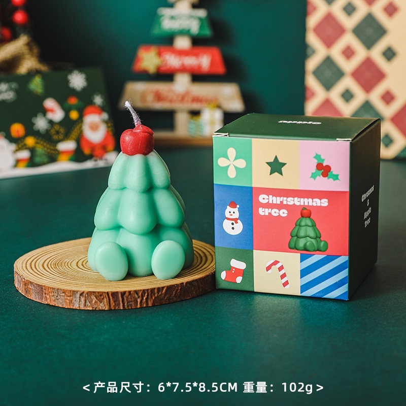 Apple Christmas Tree scented candles create an atmosphere as a souvenir gift. Handcrafted scented candles simulate Christmas shapes, wax candles, and scented candles for Christmas Application Scenario