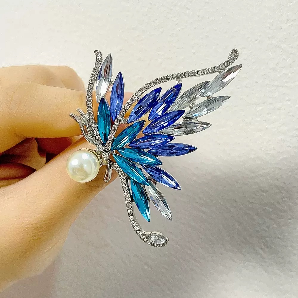 Butterfly cartoon brooches, pins, clothes, accessories, silver and blue coats, sweaters, skirts, evening gowns detail image 2