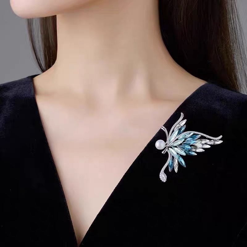 Butterfly cartoon brooches, pins, clothes, accessories, silver and blue coats, sweaters, skirts, evening gowns detail image 3